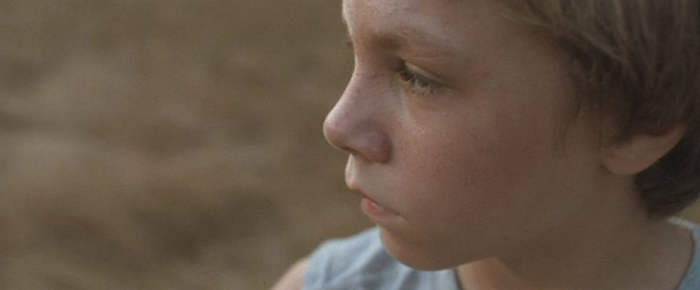 Close-up of Daniel Blanchard as The Boy.