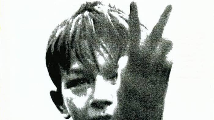 Kes (1969) Promotional poster : disaffected teen raising two fingers to the world