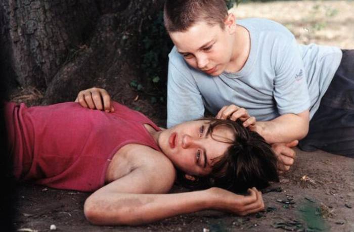 Vincent Rottiers as Joseph and Adèle Haenel as Chloé in The Devils (2002), captured in a moment of intimacy and uncertainty.