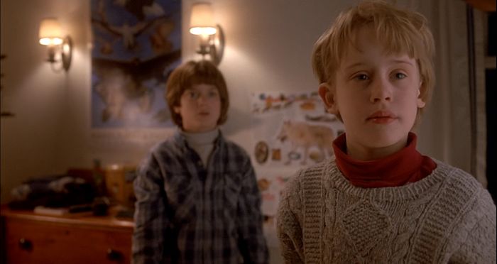 The contrast between the expressions of Macaulay Culkin and Elijah Wood in this scene from The Good Son (1993) captures the film's central tension between good and evil