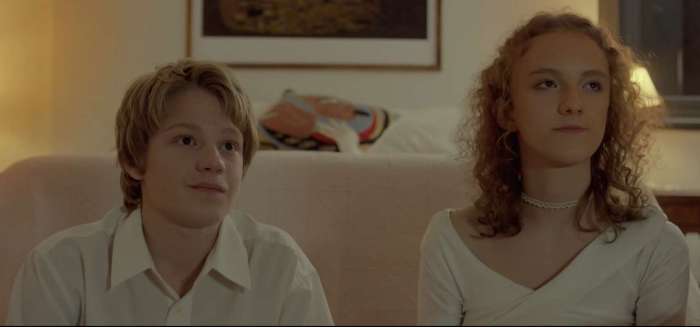 Felipe Szumik as Felipe and Catalina Oliva as Lucía share a quiet moment together in the 2023 Argentine Coming-of-Age drama Felipe.